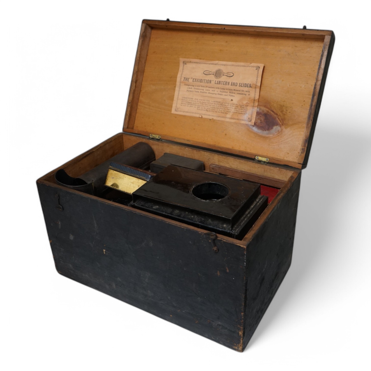 An Exhibition magic lantern and slides, cased, 44cm wide. Condition - commensurate with age and use